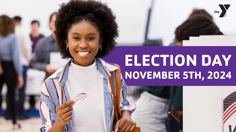 women displaying an i voted sticker